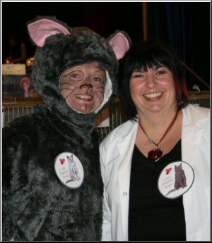 Judith Noble stewarding a strangest looking cat in show! 